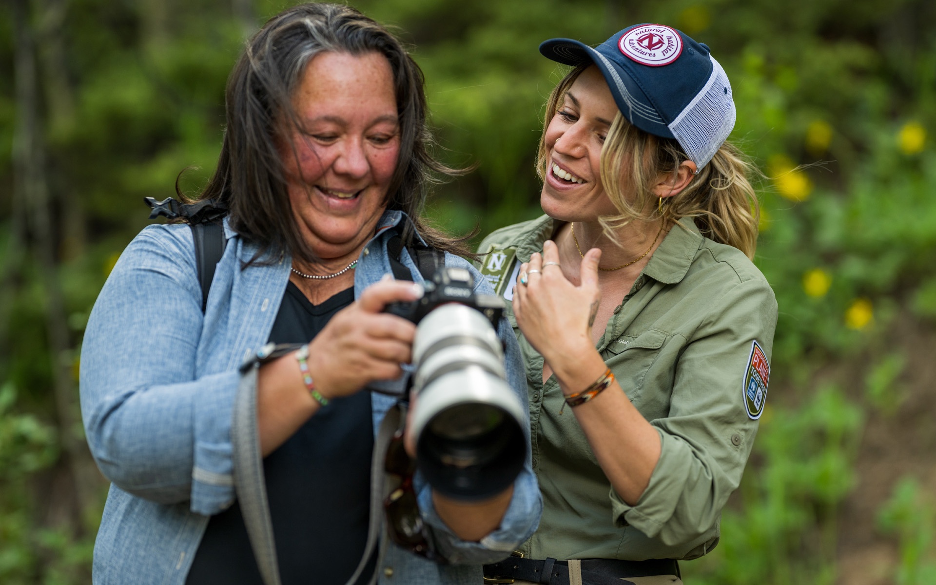 Nat Hab guest and photo expedition leader naturalist guide taking pictures in nature wilderness
